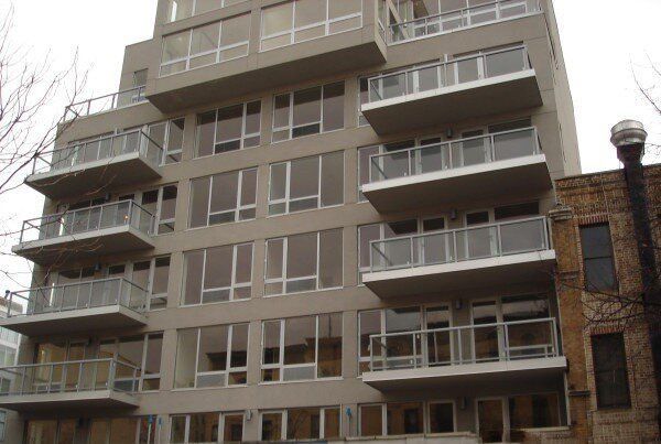 A building with a lot of windows and balconies