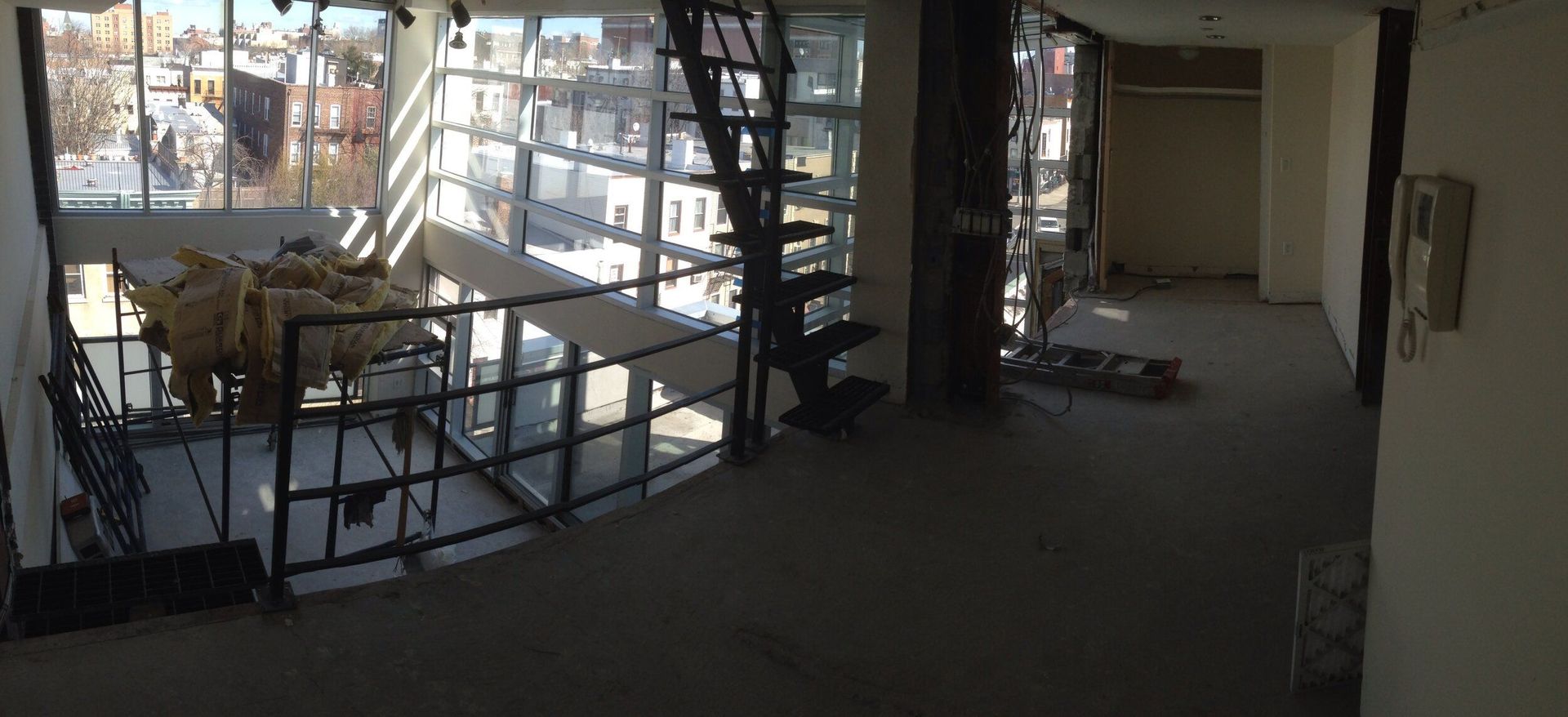 There is a staircase in the middle of the room.