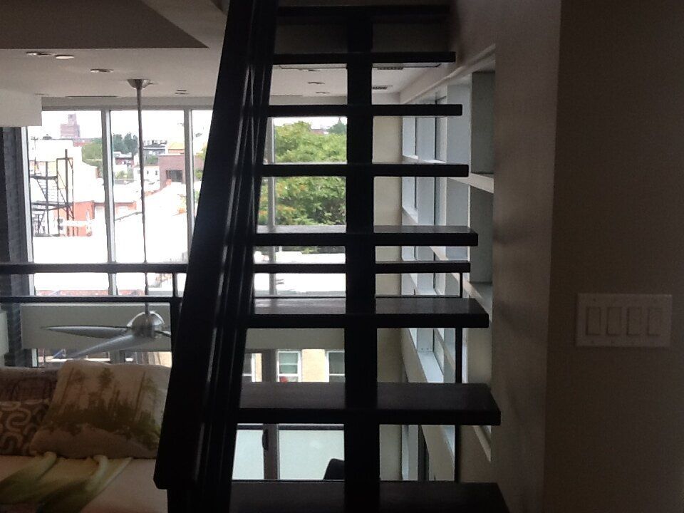 A staircase leading up to the second floor of a house