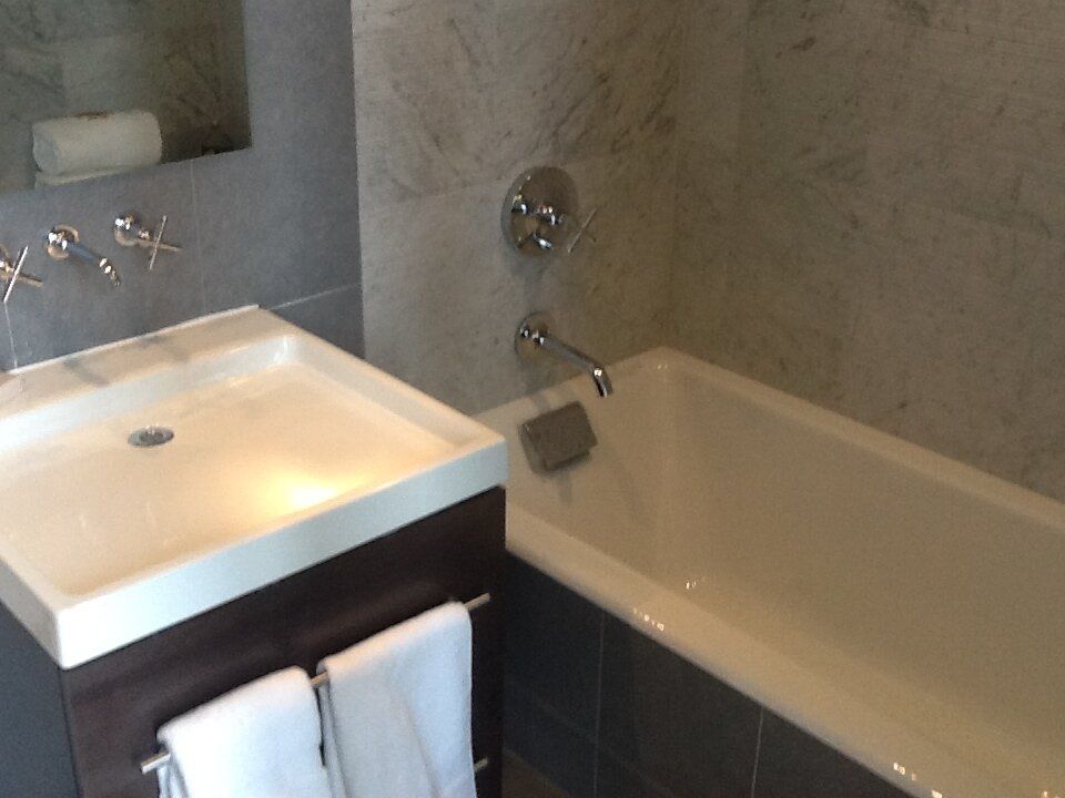 A bathroom with a sink and a bathtub