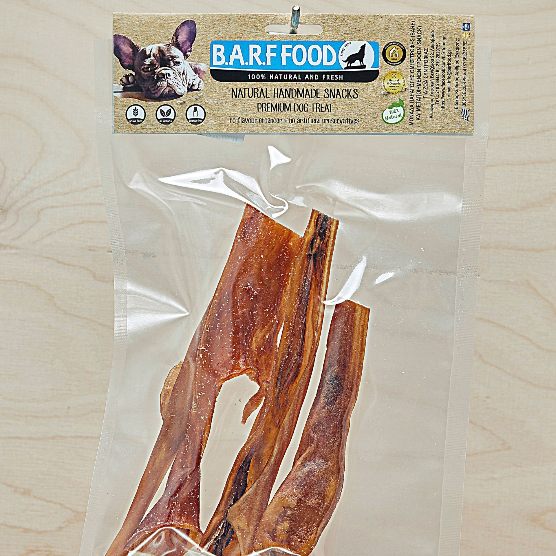 Σακούλα με μάσημα για σκύλους, μάρκας BARF Food, με εικόνα μπουλντόγκ. Διαφανής πλαστική συσκευασία.
