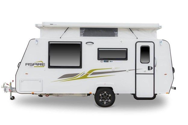a white caravan with a green stripe on the side is on a white background .