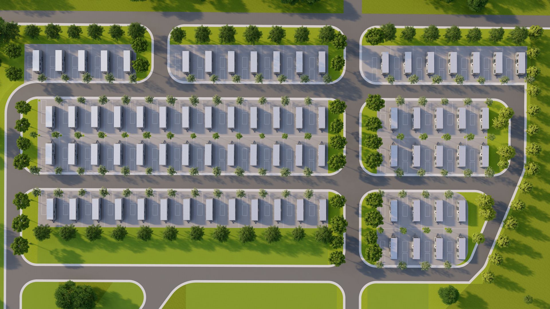 Overhead view of a planned neighborhood with rows of houses, parking, and landscaping with roads and trees.