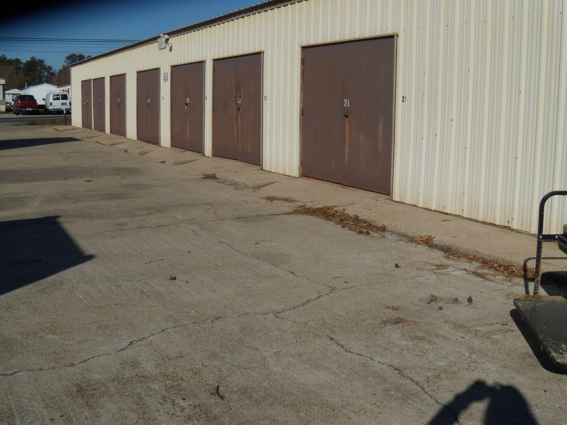 A storage with two roller doors and a metal roof