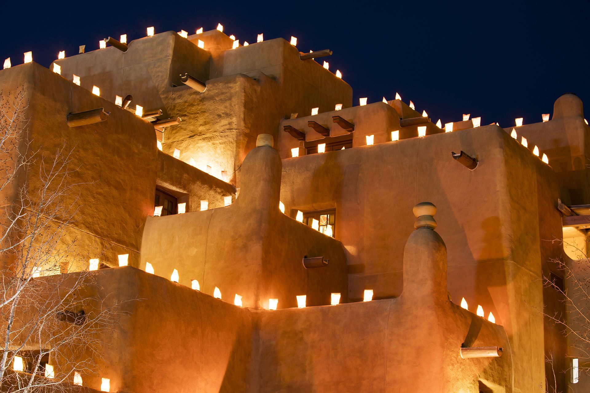 adobe style building lit up at night
