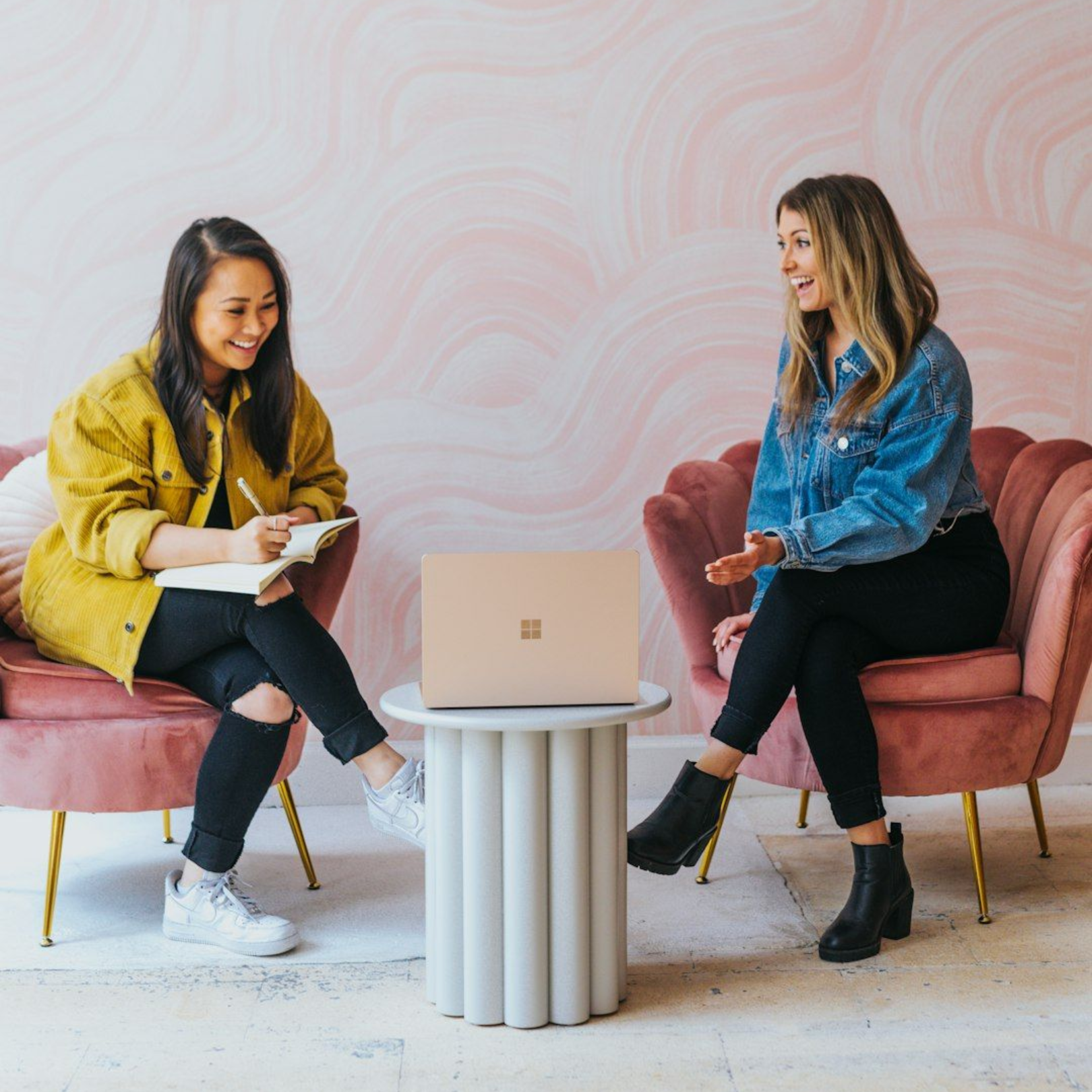 Our digital marketing expert meeting with a client discussing seo results.