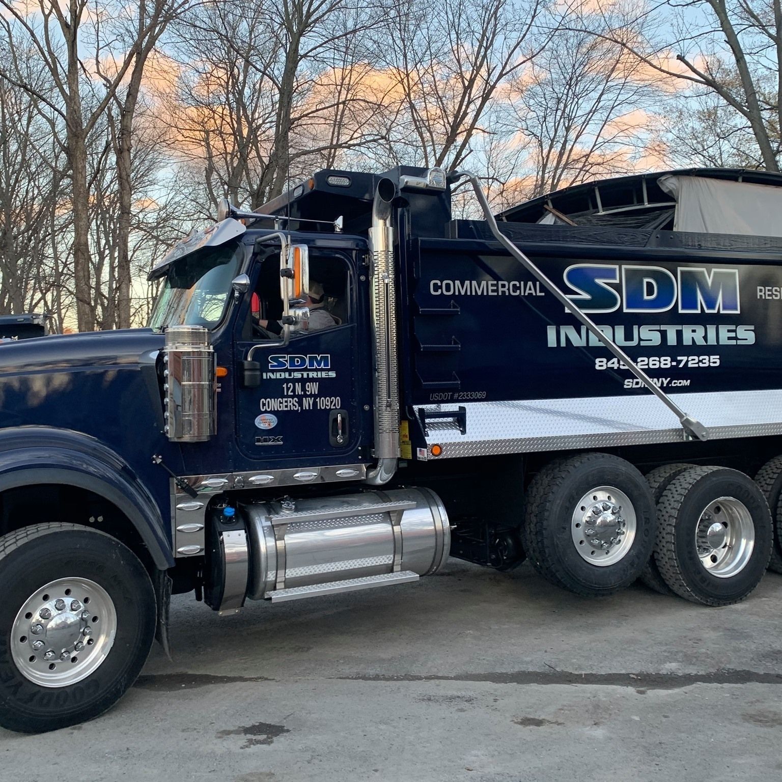 Excavators on Truck — Congers, NY — SDM Industries Inc.