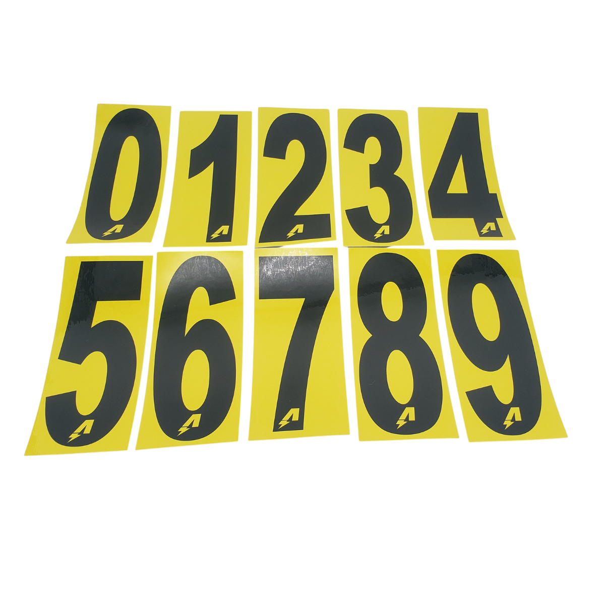 Yellow number tiles with black digits 0–9 arranged in two rows