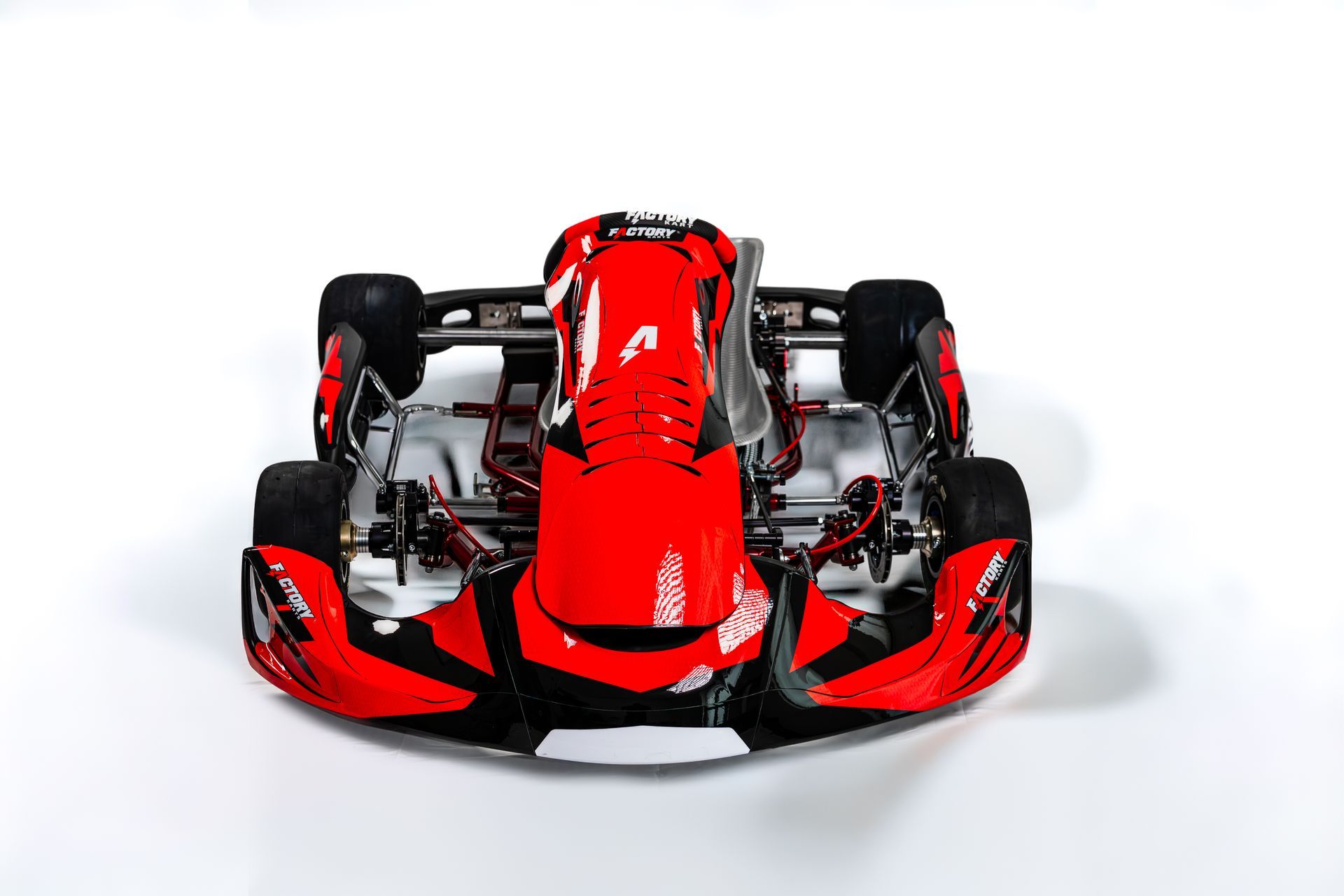 Red and black Factory Karts DD2 Chassis photographed from the front on a white background