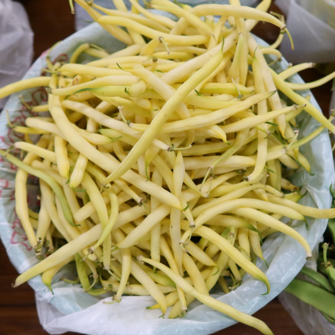 There are two different types of green beans , one yellow and one green.