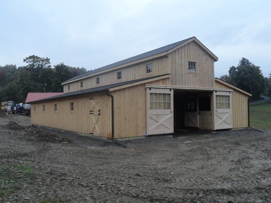 tan horse barn