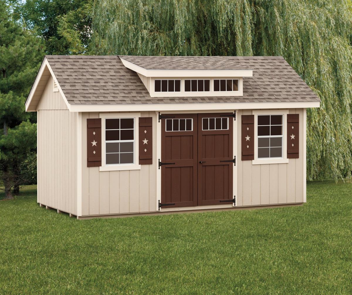 dormer shed with cream siding and brown doors 
