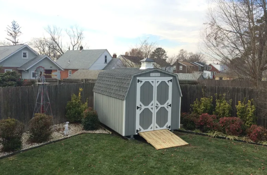 gray mini barn shed with ramp