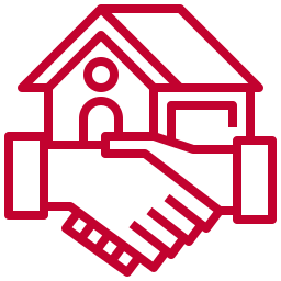 Icon of a handshake in front of a building