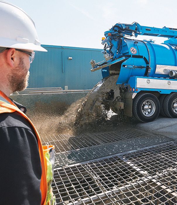 Hydrovac truck dumping slurry
