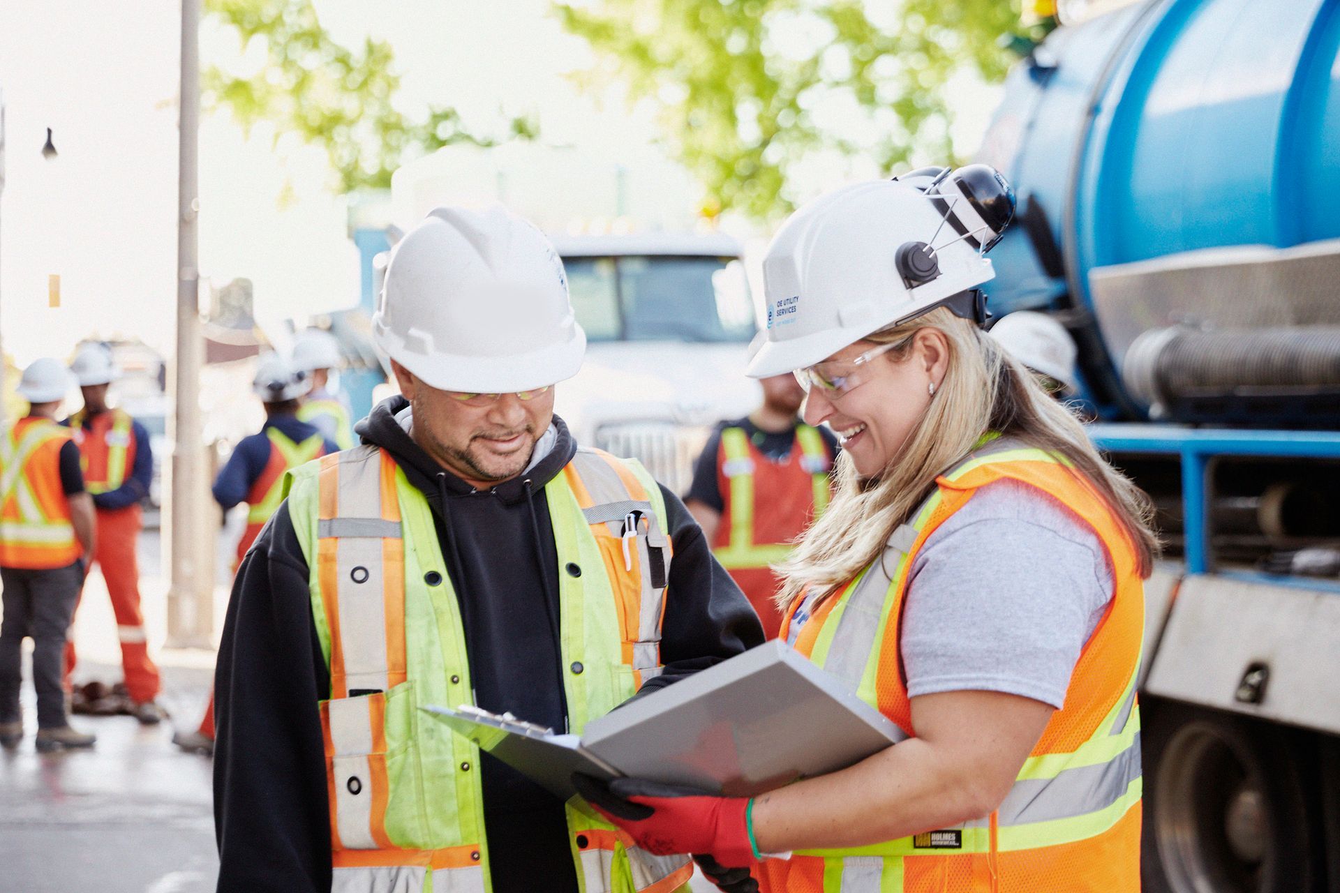 OE employee speaking to a client