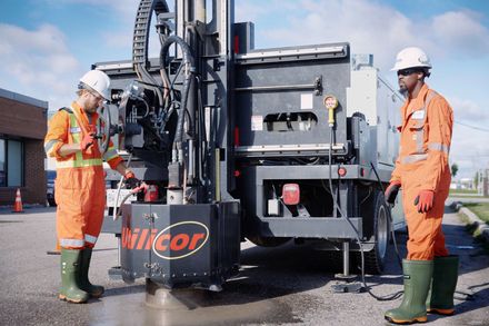 Employee coring the concrete