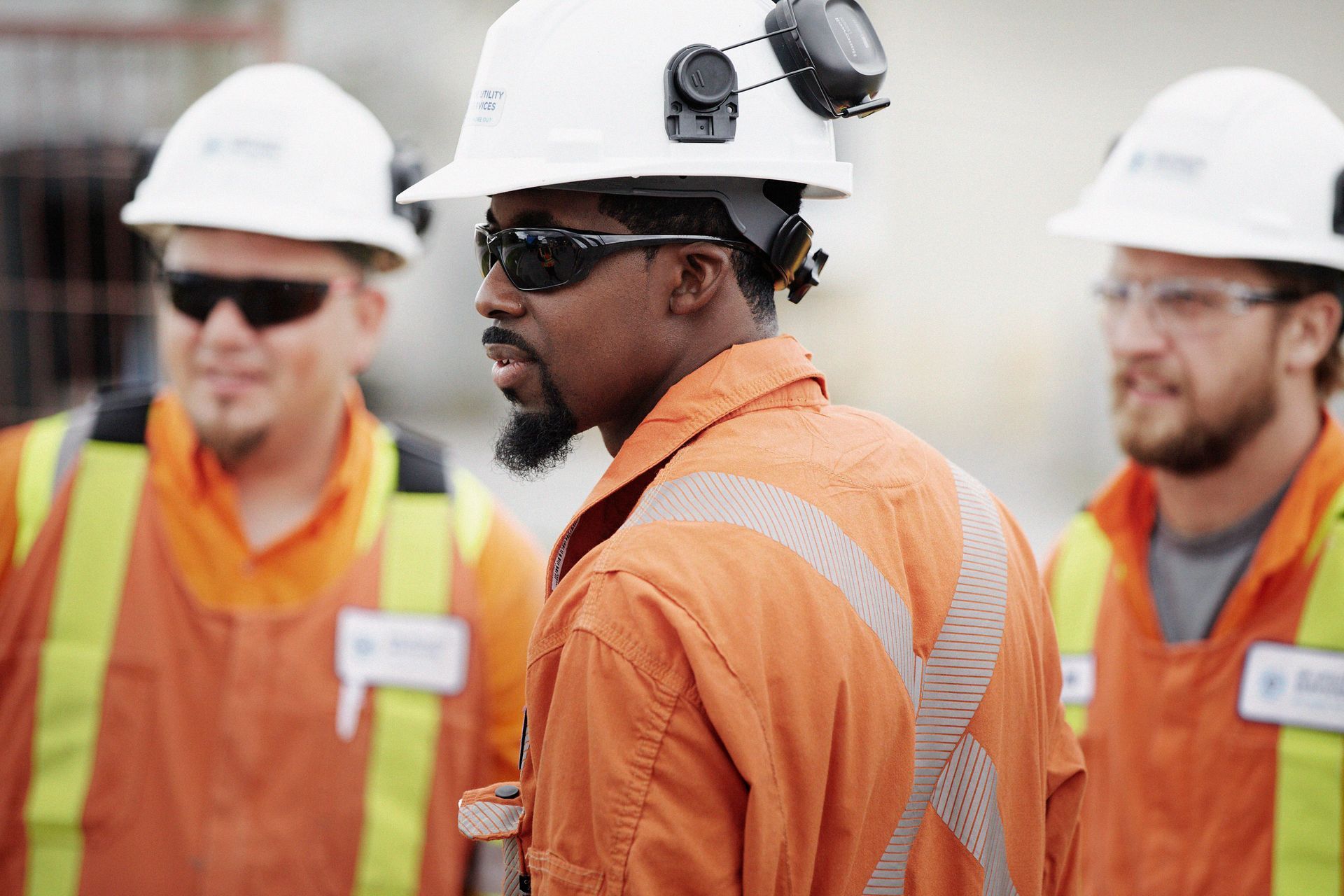 Employee performing road cutting