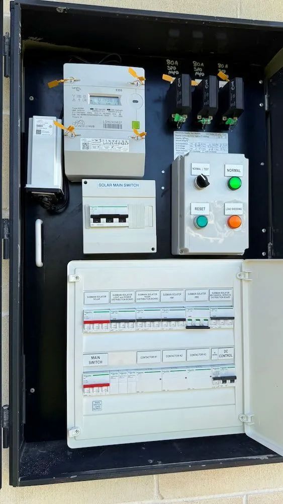 A Black Box With a Bunch of Electrical Equipment — DG Electrical & Fire In Gerringong, NSW