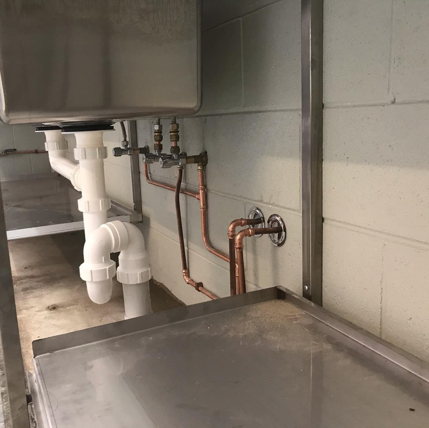 Pipes Under Kitchen Sink — Rossi Plumbing in Gold Coast, QLD