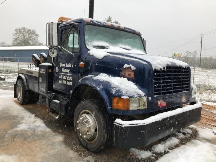 tow truck in snow