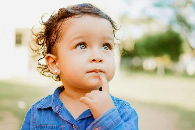 toddler looking up at someone or something
