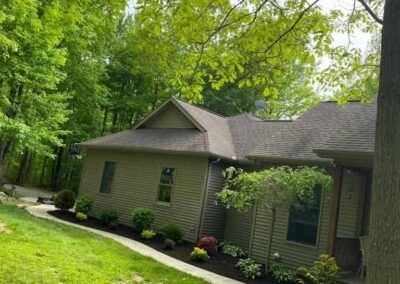 House with Roof and Surrounded by Trees — Erie, PA — Saldana Services LLC