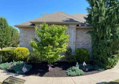House with Landscaping In Front of It — Erie, PA — Saldana Services LLC