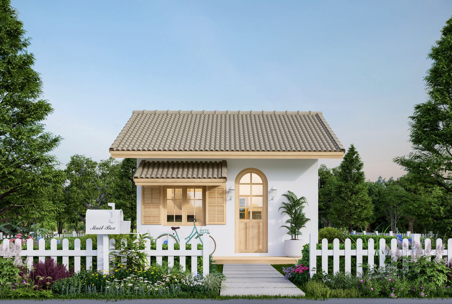 A small white house with a white picket fence in front of it.