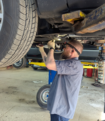 Mechanic working on a car | HMI Auto Care