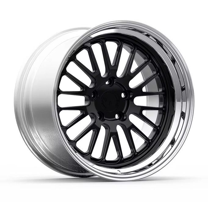 Black multi-spoke alloy wheel rim on a white background