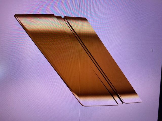 Abstract orange-brown geometric shape on a light purple background