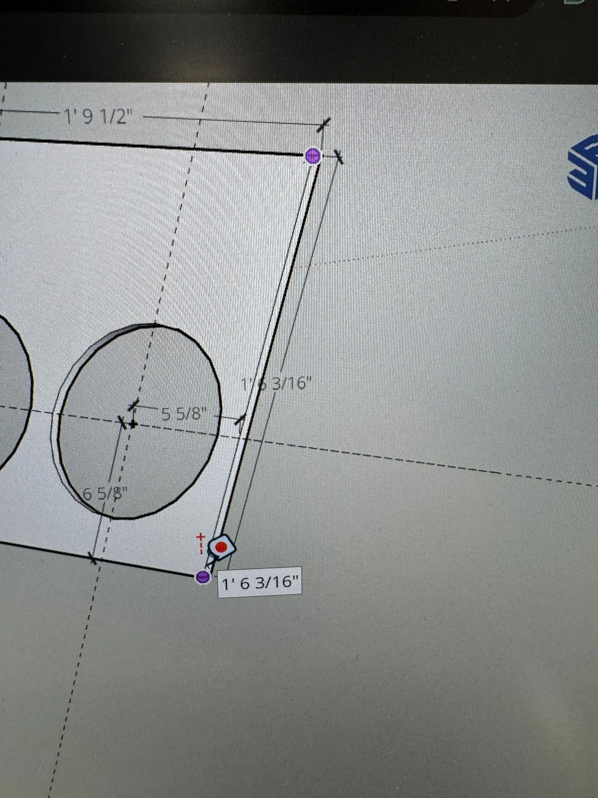 Close-up of a CAD sketch with two circles and a slanted line on a gray canvas.