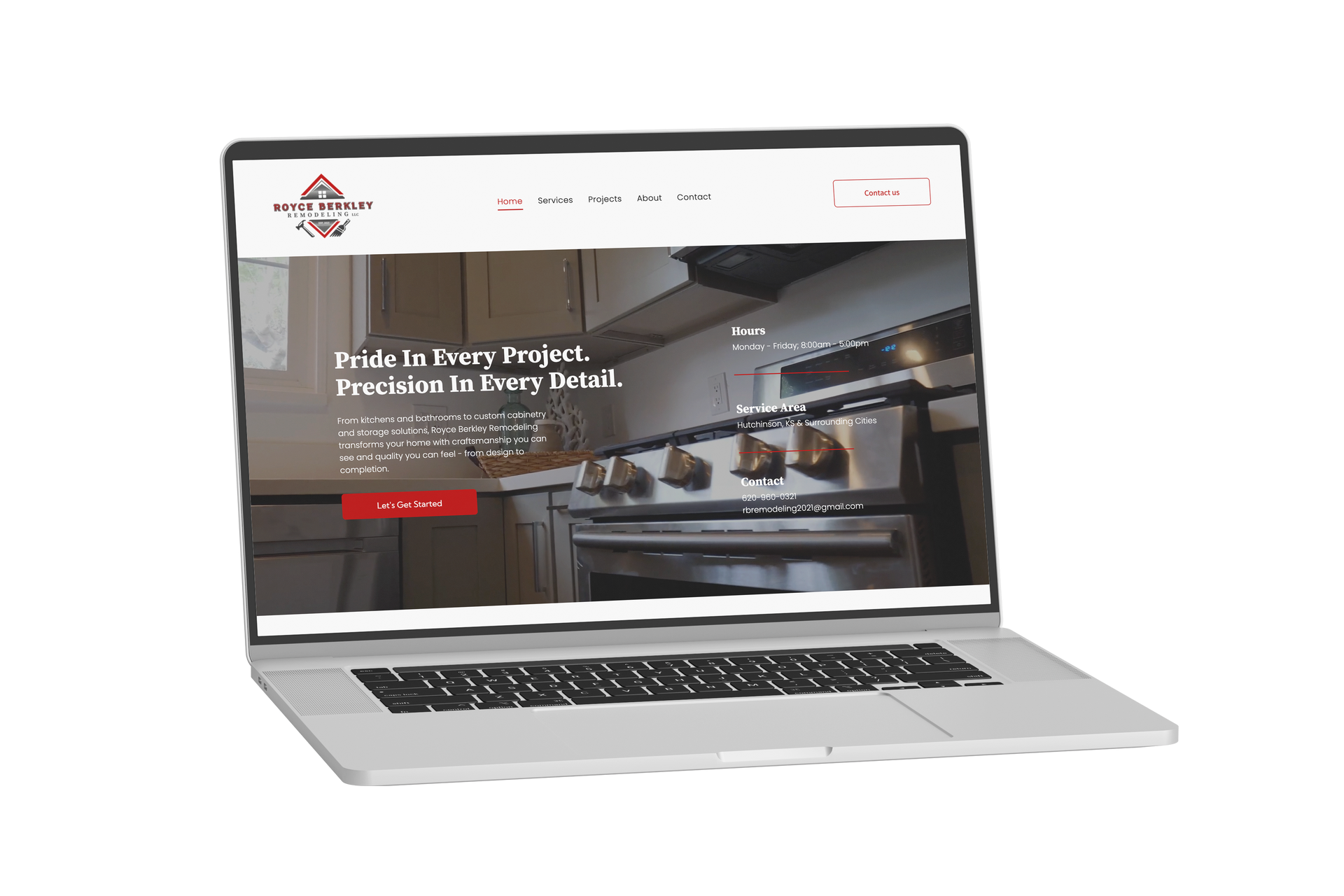 Laptop displaying a website with kitchen cabinetry.