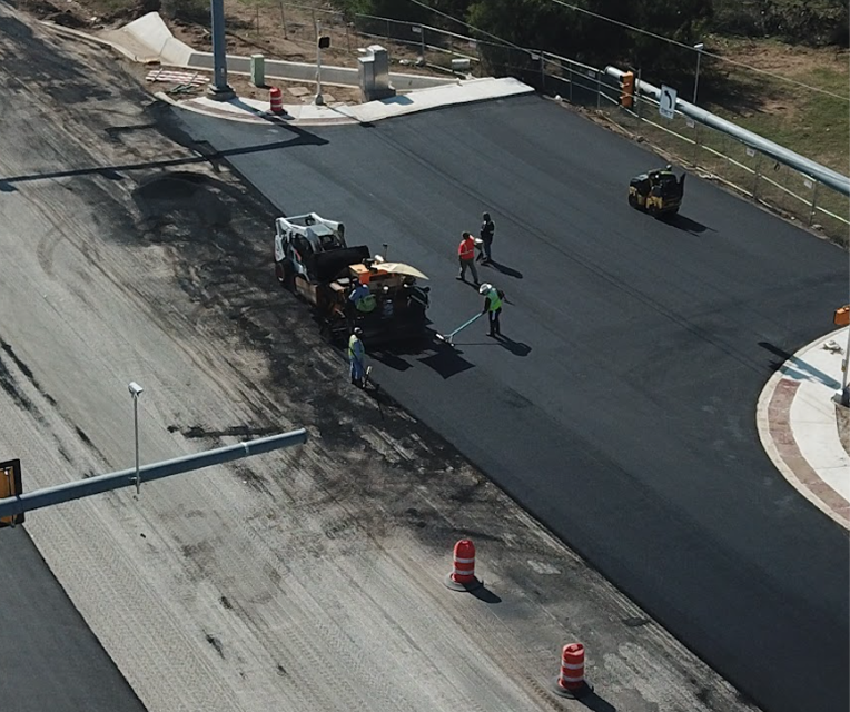 Pro-Line Paving crew paving a commercial roadway in San Antonio, TX