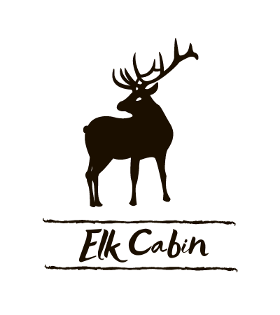 Black elk silhouette above the words “Elk Cabin” on a white background