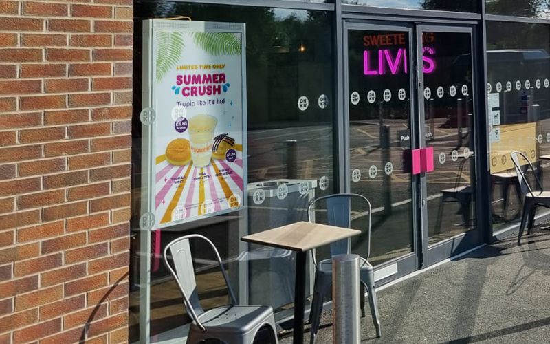 A cafe storefront with a 