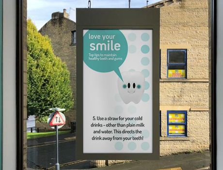 A sign that says love your smile on it