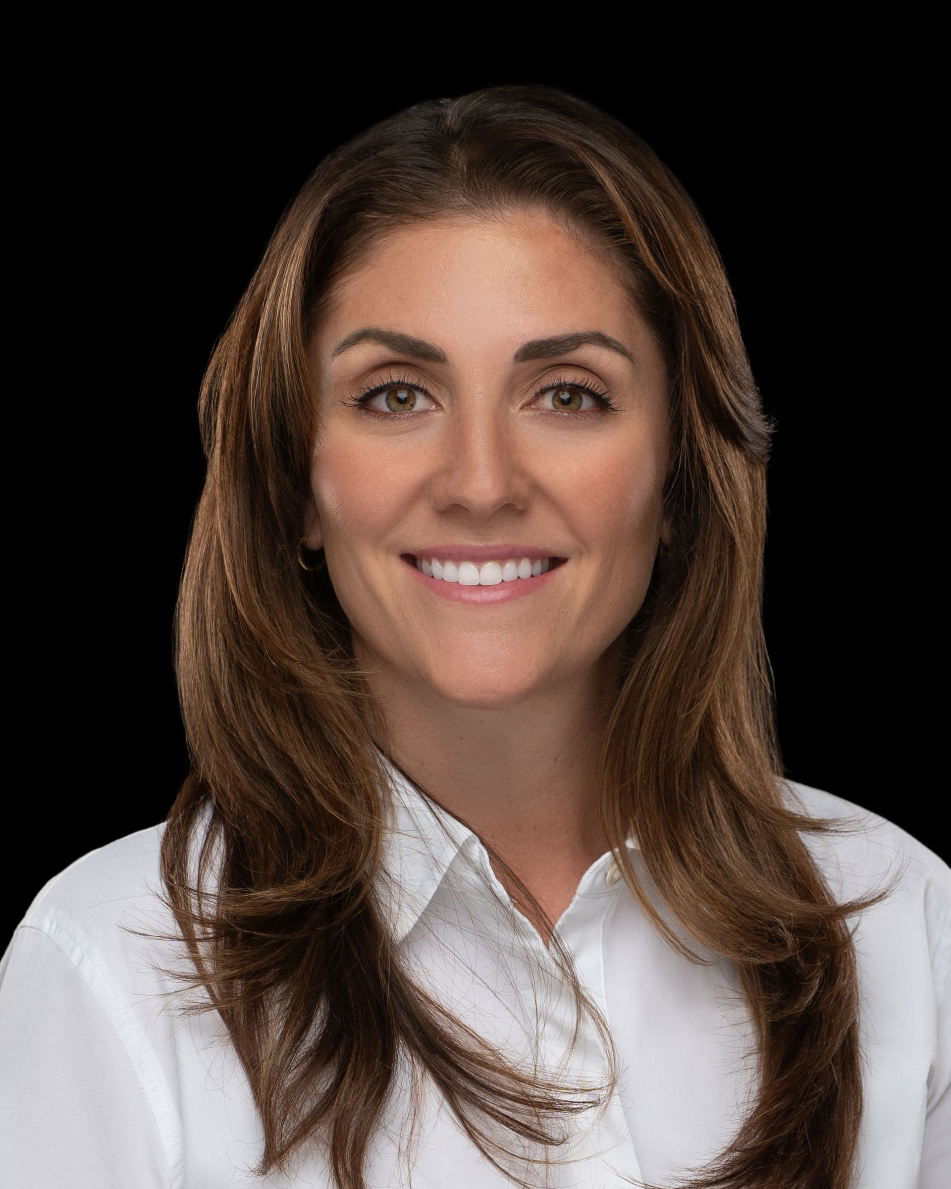 Studio headshot portrait with clean black background for corporate branding