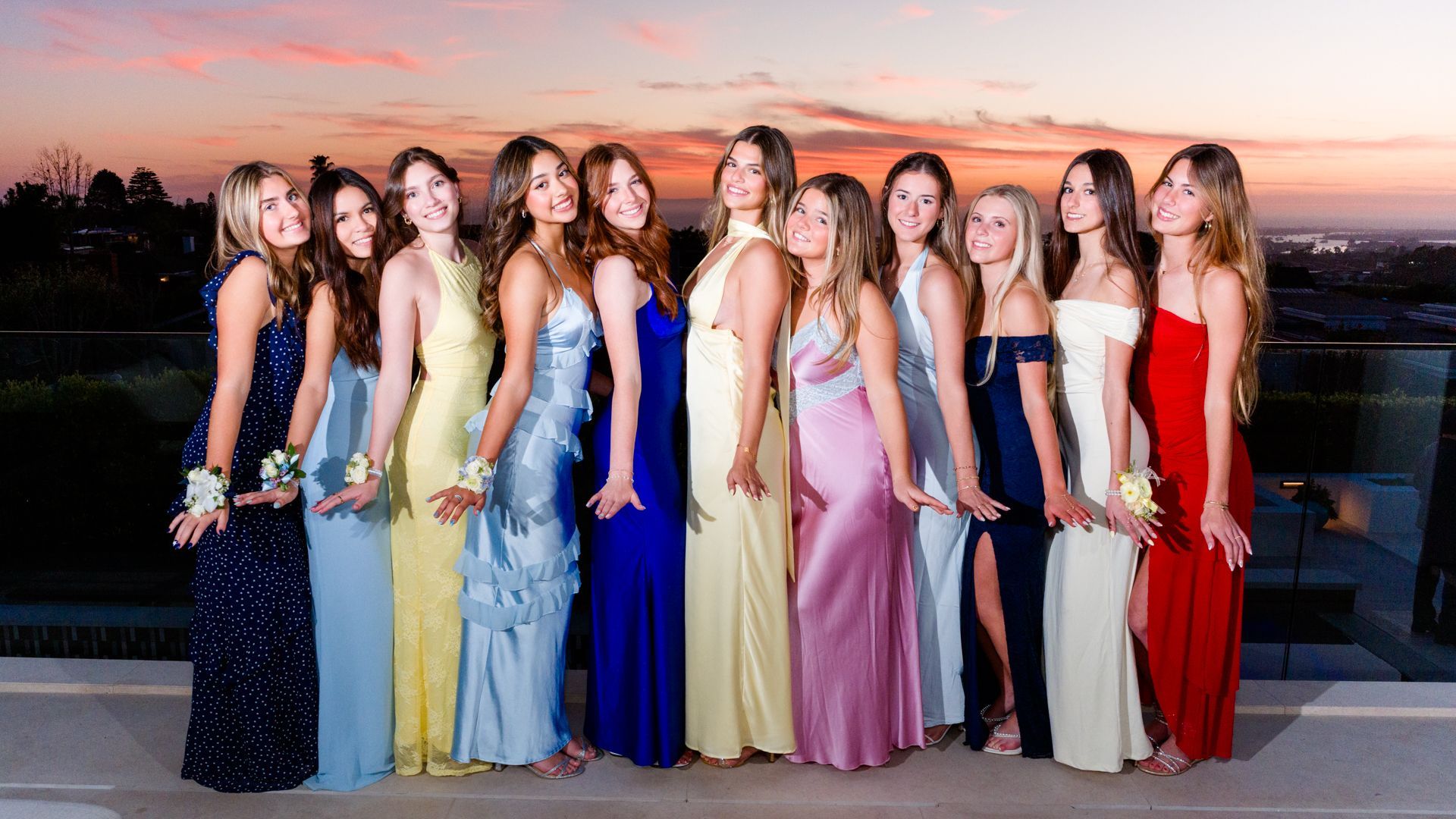 A group photo of high school girls in Winter Formal dress.