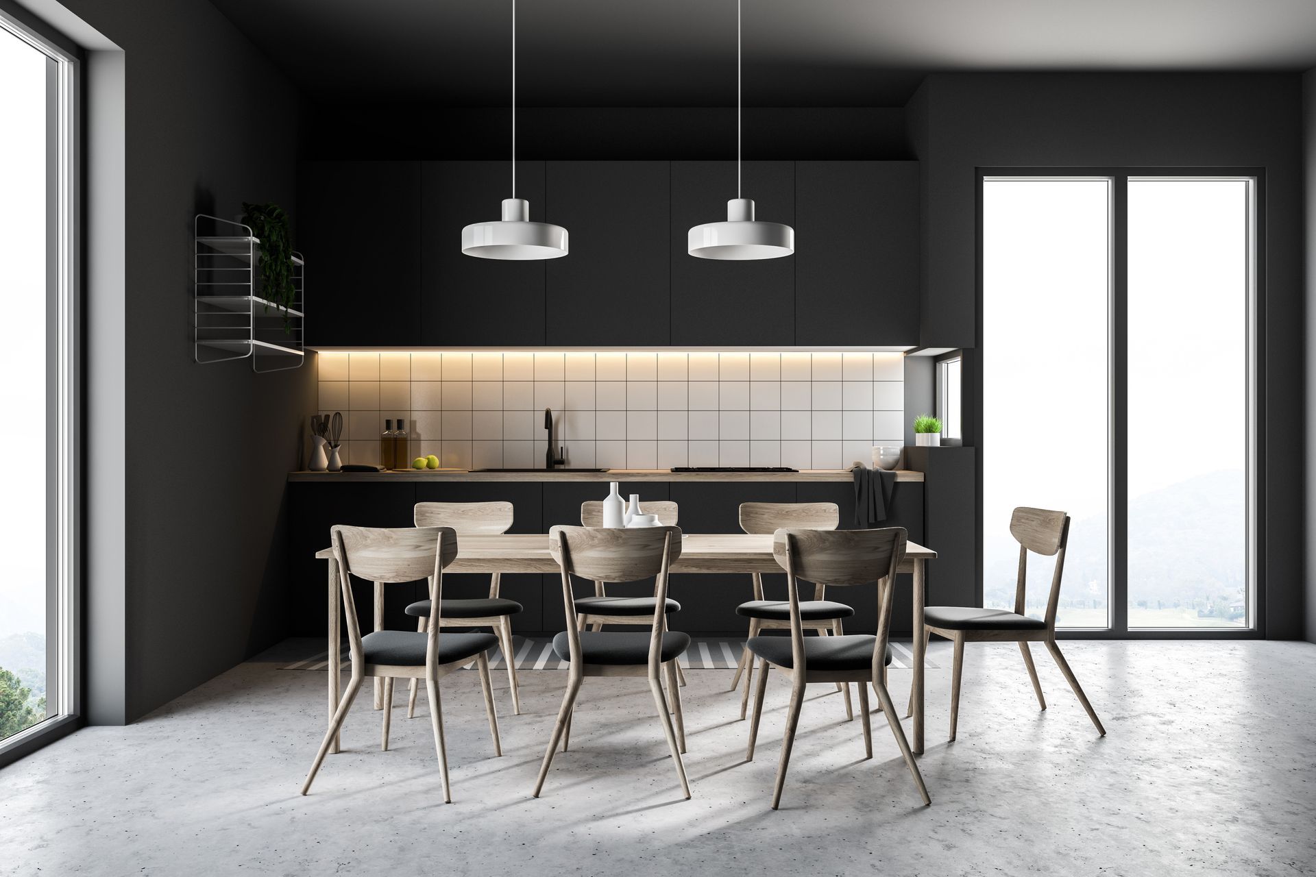 A dining room with a table and chairs in a kitchen.
