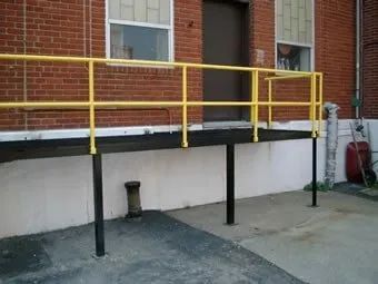 Raised Metal Platform and Yellow Railings