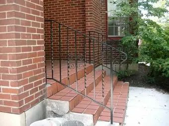 Iron Railings and Red Brick Building