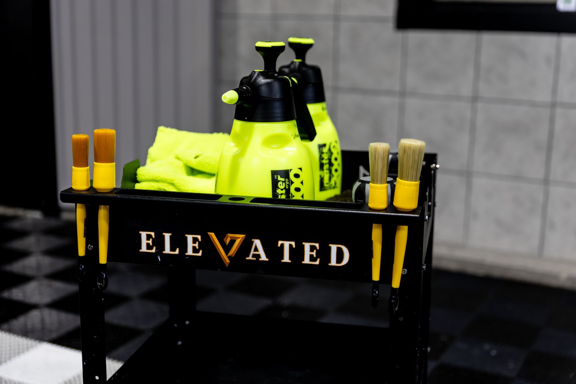 A black cart with the word elevated on it