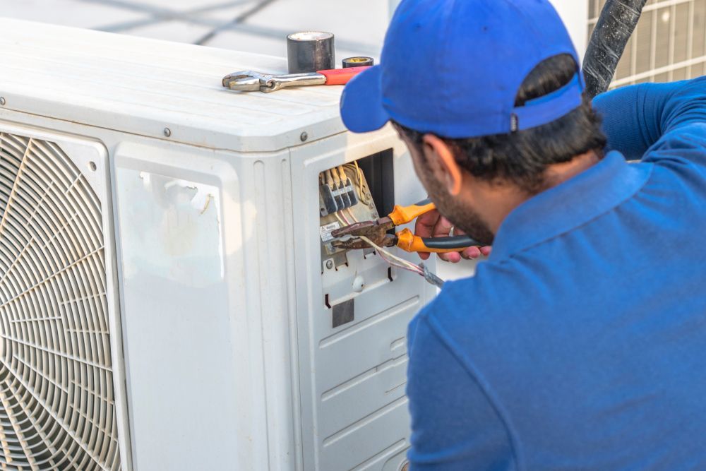 portrait midadult male technician testing air