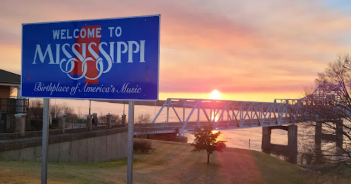 Moving to Mississippi Welcome sign body of water Gulf Coast