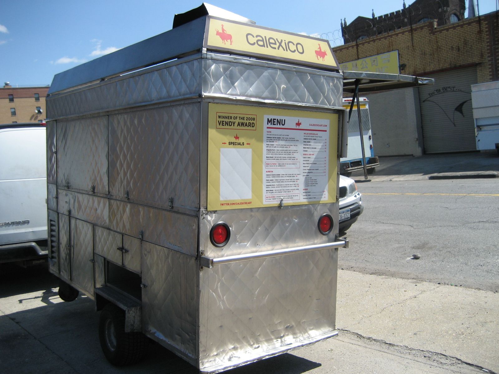 A stainless steel trailer with the word calexico on it