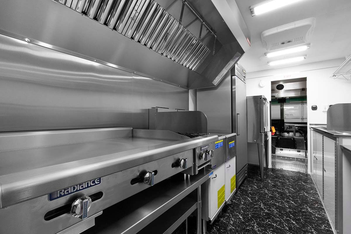 a kitchen with stainless steel appliances