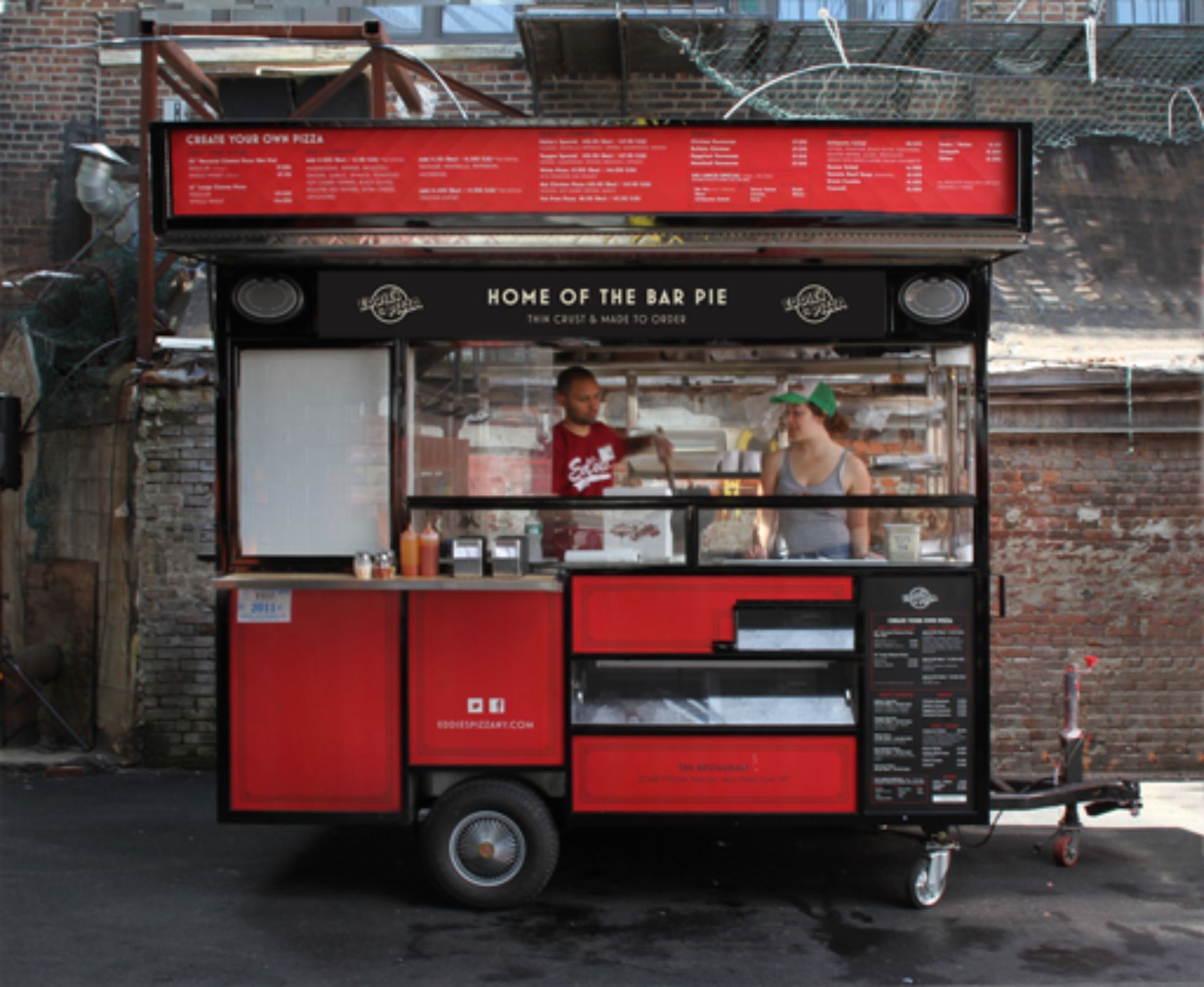 A food truck that says home of the bar pie