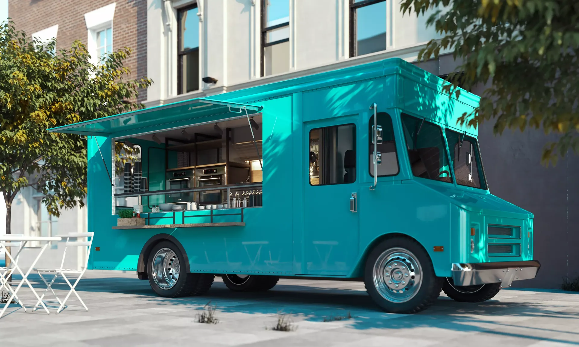 A blue food truck is parked in front of a building.